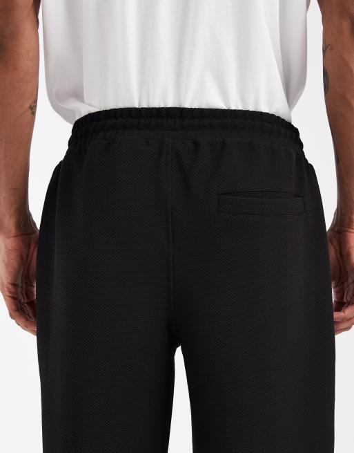 ASOS DESIGN straight leg smart textured trackies in black, 5 of 5