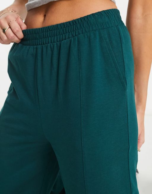 ASOS DESIGN flared sweatpants in forest green