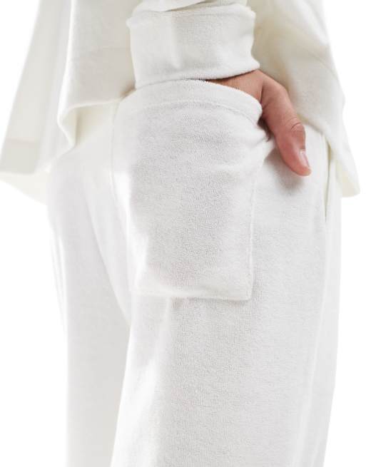 ASOS DESIGN straight leg sweatpants in texture in off white, 2 of 5