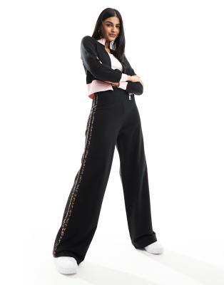straight leg sweatpants with leopard side stripe in black