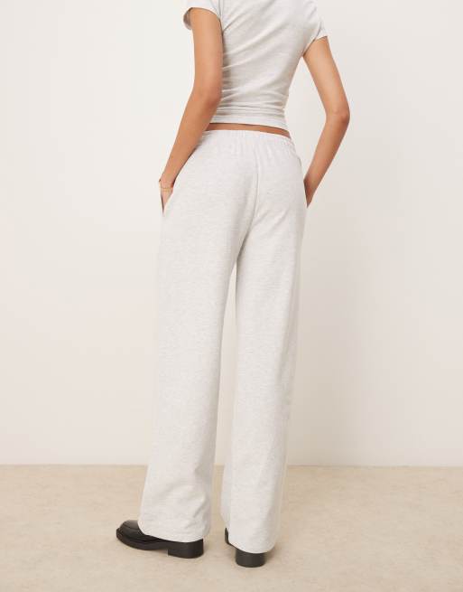 ASOS DESIGN straight leg sweatpants with Marseille embroidered graphic in ice heather, 4 of 5