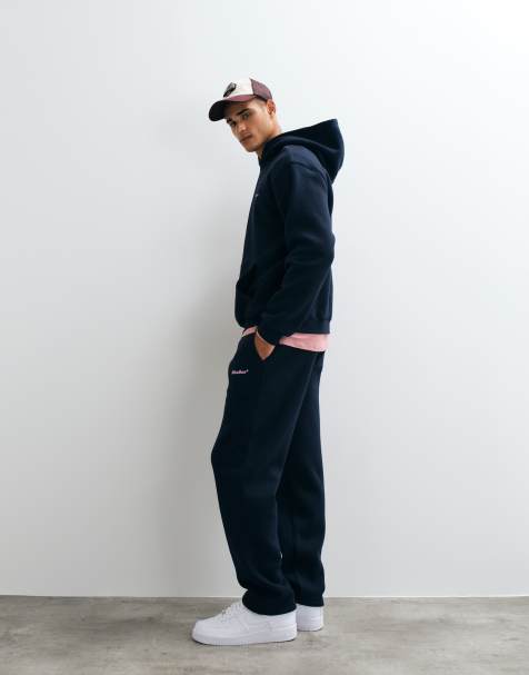 ASOS DESIGN straight leg sweatpants with pigment print in navy - view 1