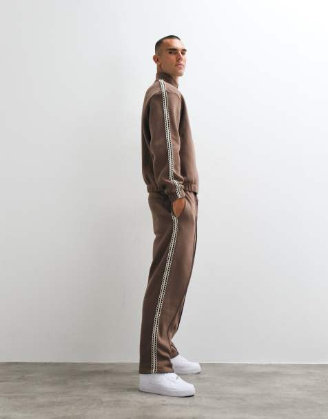 ASOS DESIGN straight leg sweatpants with woven tape in brown - view 1