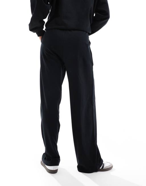 ASOS DESIGN straight leg trackies in black, 2 of 5