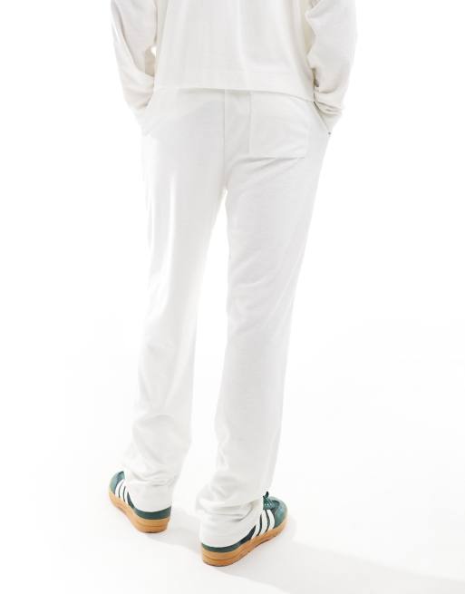 ASOS DESIGN straight leg trackies in texture in off white, 4 of 5