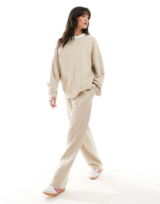 ASOS DESIGN straight leg trackies in washed stone