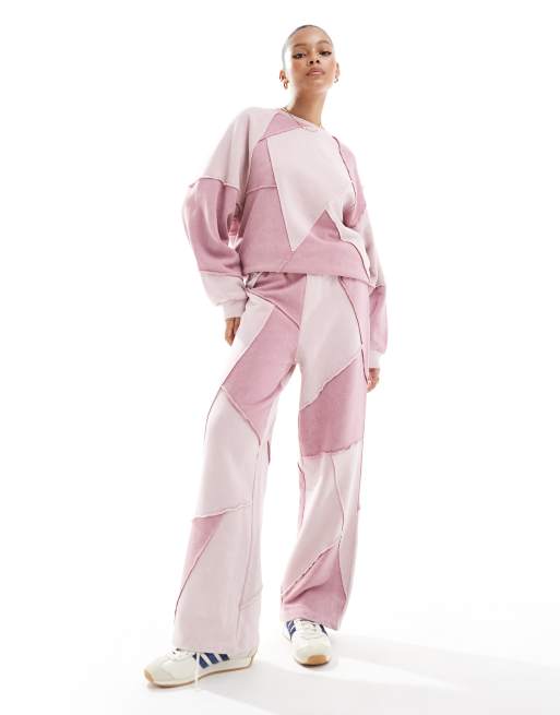 ASOS DESIGN straight leg trackies with patchwork detail in pink wash (part of a set)