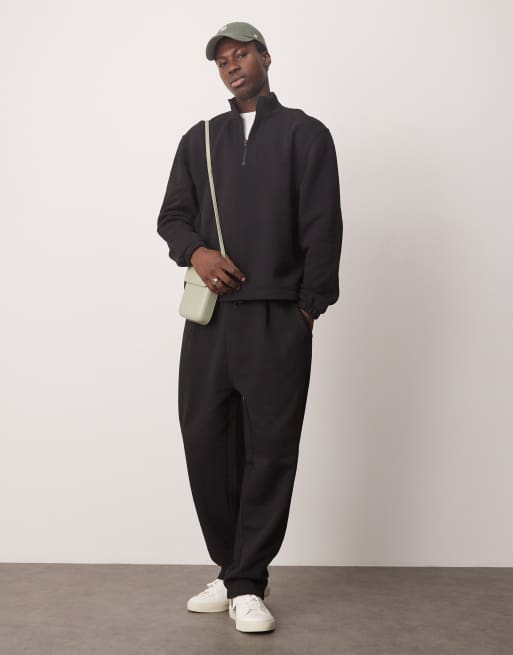 ASOS DESIGN straight leg trackies with pleat in black (part of a set)