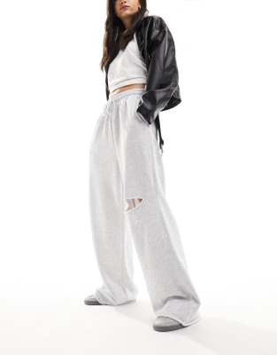 ASOS DESIGN straight leg trackies with ripped knee in ice marl