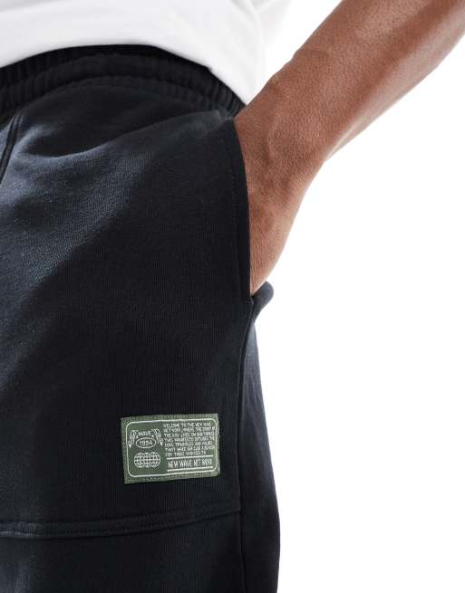 ASOS DESIGN straight leg workwear trackies in black (part of a set), 3 of 5