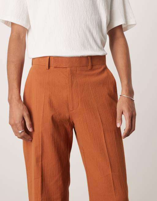 ASOS DESIGN straight suit pants in rust crinkle texture
