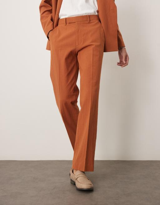 ASOS DESIGN straight suit pants in rust crinkle texture
