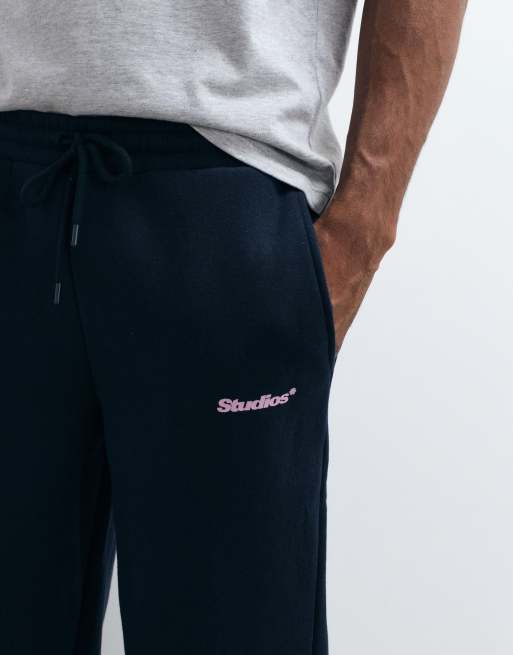 ASOS DESIGN straight trackies with pigment print in navy, 3 of 5