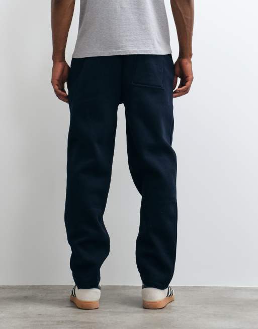 ASOS DESIGN straight trackies with pigment print in navy, 4 of 5