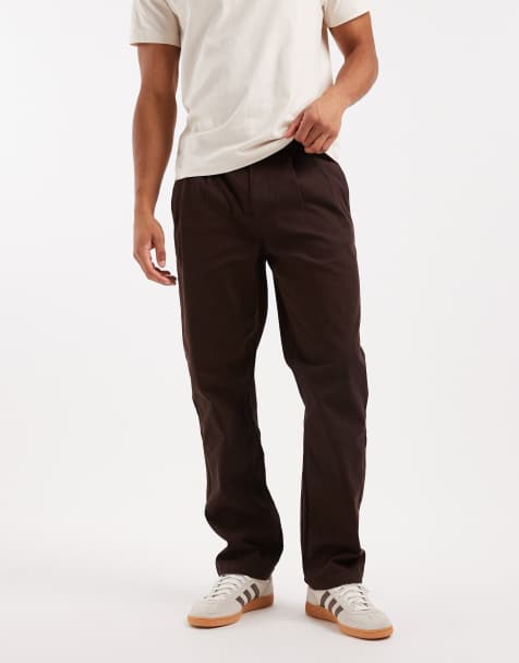 ASOS DESIGN straight trousers in brown with pleats and side cinch - view 1