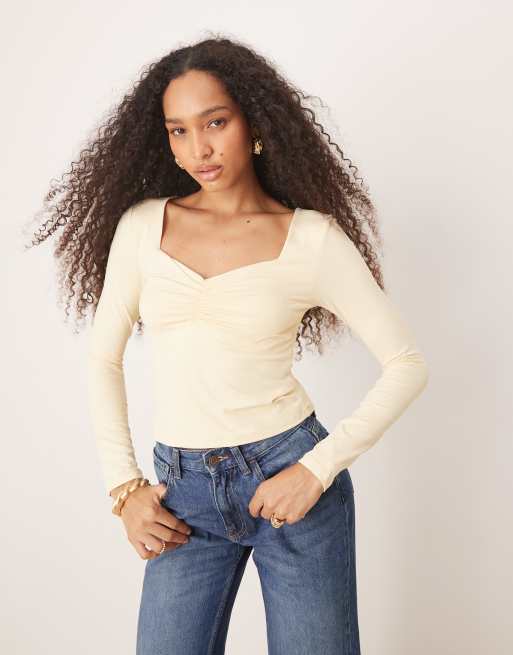 ASOS DESIGN - Stram og langærmet top i polyamid med rynket bryst i pastelgul