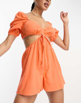 ASOS Design - Strand-Playsuit in Orange mit Cut-out an der Taille