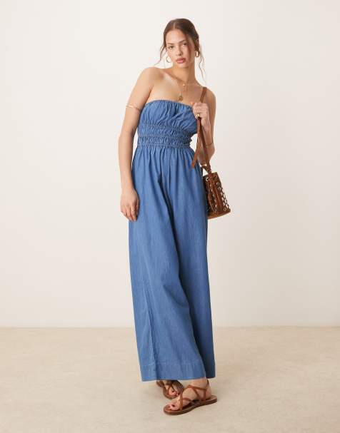 ASOS DESIGN - Strapless jumpsuit met gesmokt lijfje in mid-wash blauw - view 1