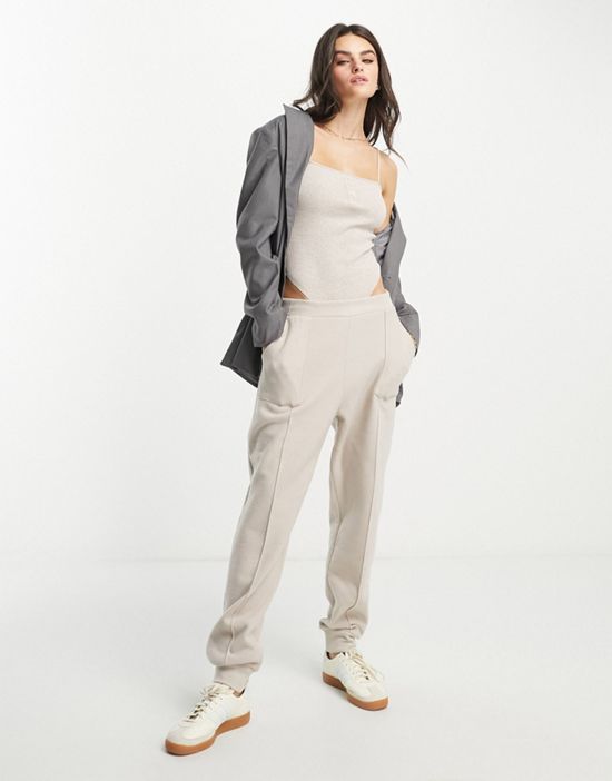 https://images.asos-media.com/products/asos-design-strappy-bodysuit-in-rib-button-detail-in-neutral-heather/202465760-2?$n_550w$&wid=550&fit=constrain