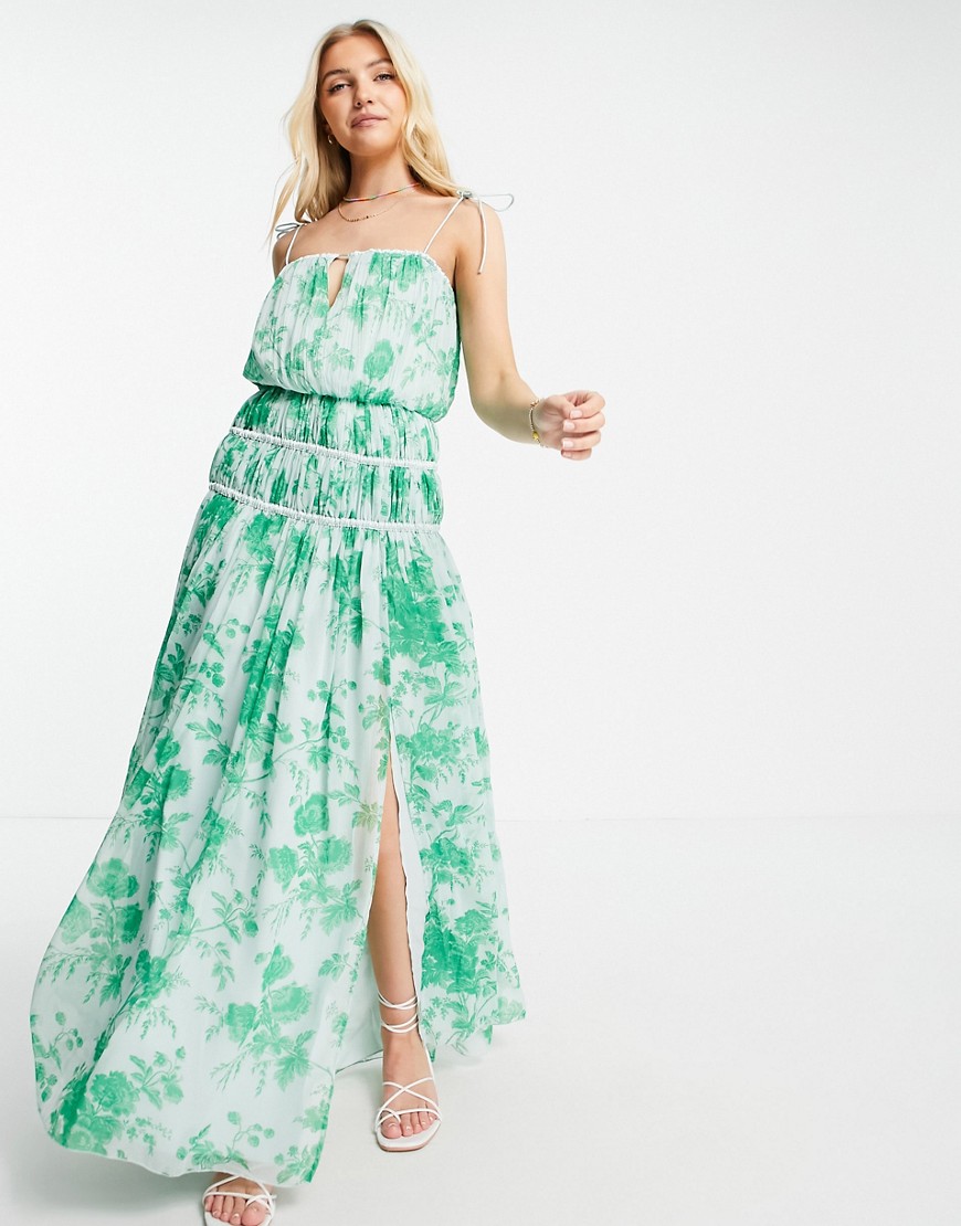 ASOS DESIGN strappy maxi dress with ruched channel detail and tie straps in green floral