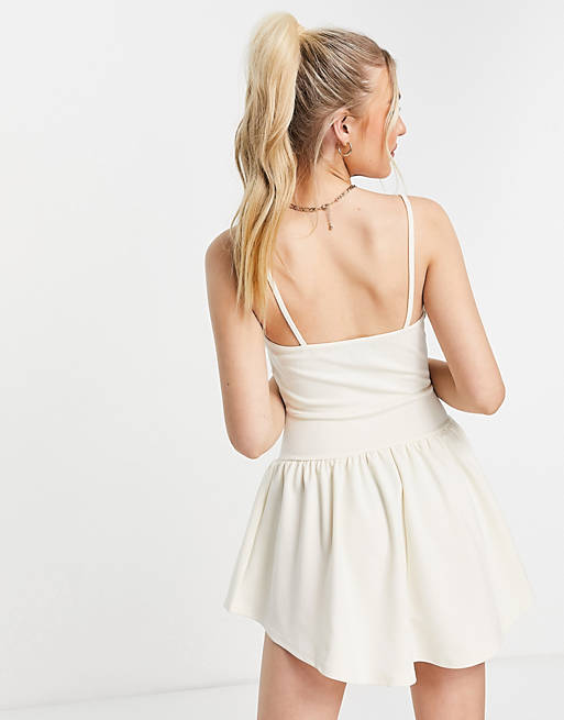 Dresses strappy mini cupped detail dress in cream 