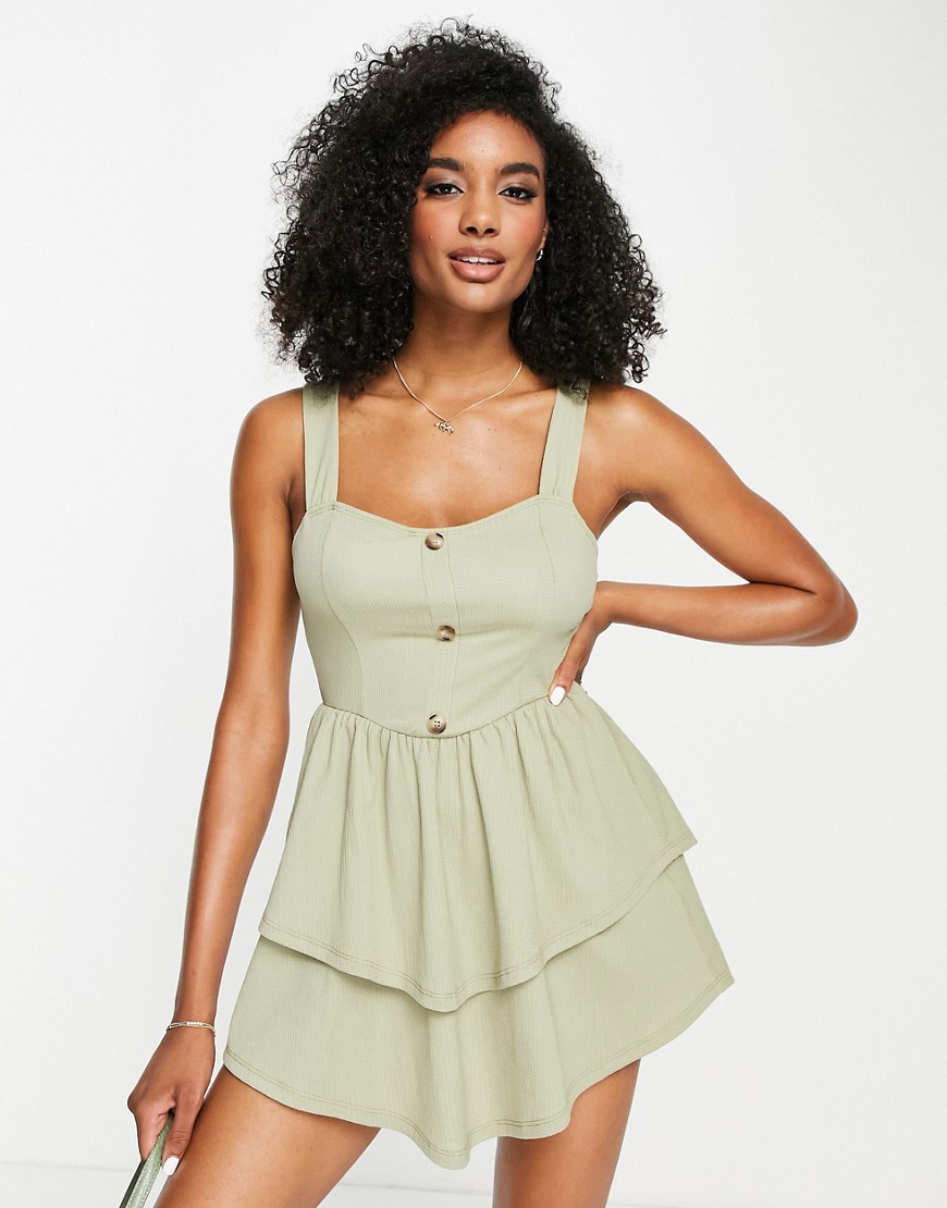 ASOS DESIGN strappy mini dress with ra ra skirt and buttons in sage green