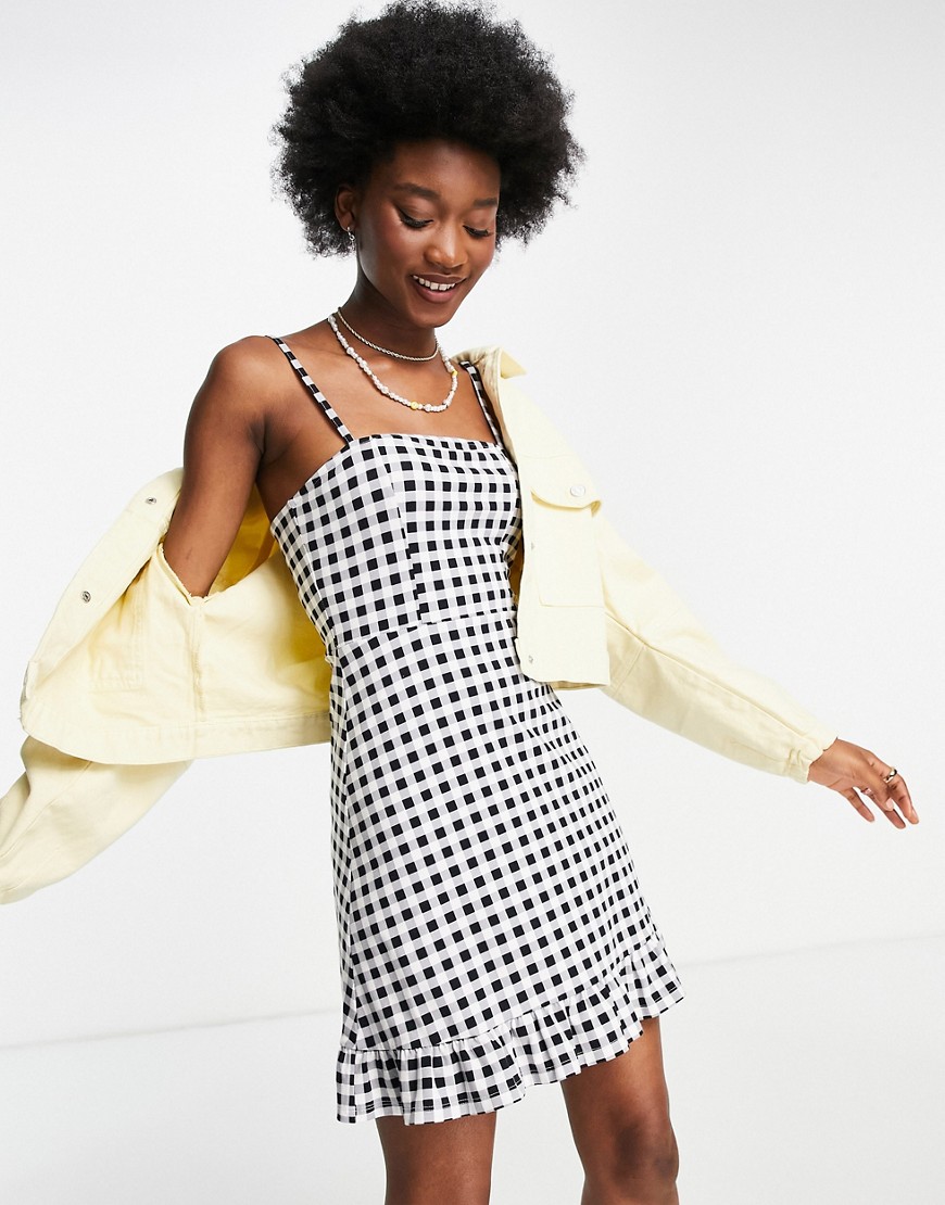 ASOS DESIGN strappy sundress with pep hem in black and white gingham