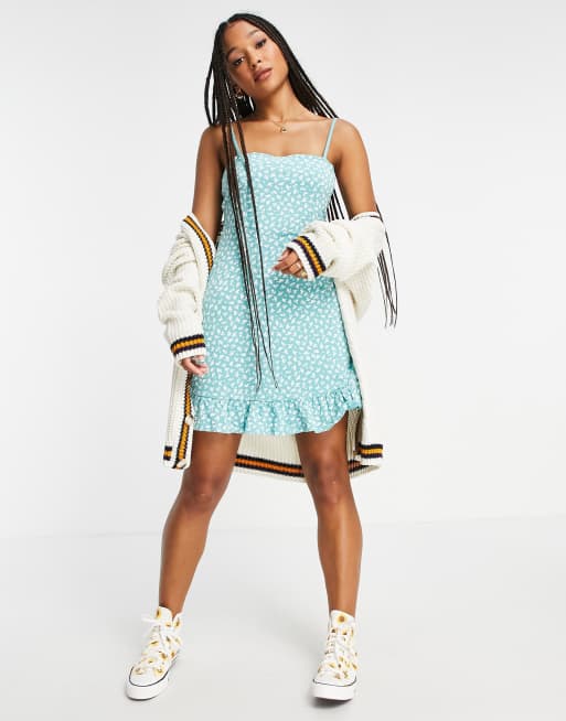 ASOS DESIGN strappy sundress with pep hem in green floral