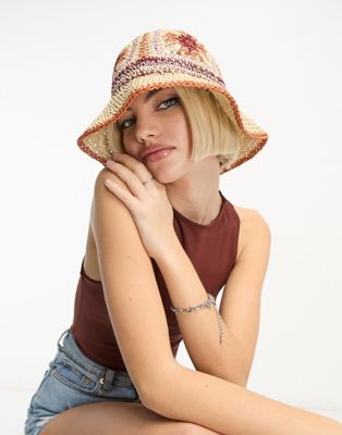 ASOS DESIGN straw crochet bucket hat with floral design in neutral multi