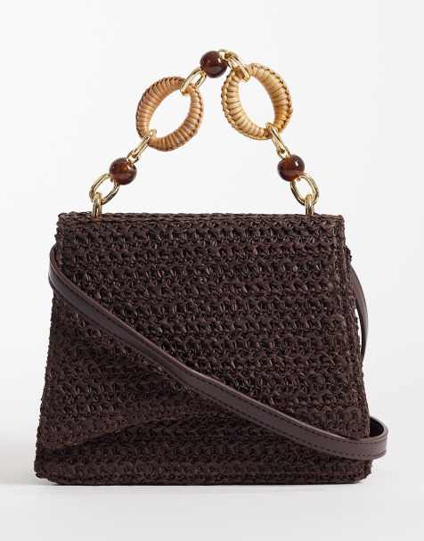 ASOS DESIGN straw crossbody bag with resin top handle and detachable cross body strap in chocolate - view 1
