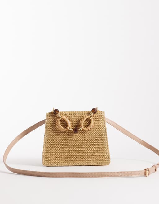 ASOS DESIGN straw crossbody bag with resin top handle and detachable cross body strap in natural, 4 of 4
