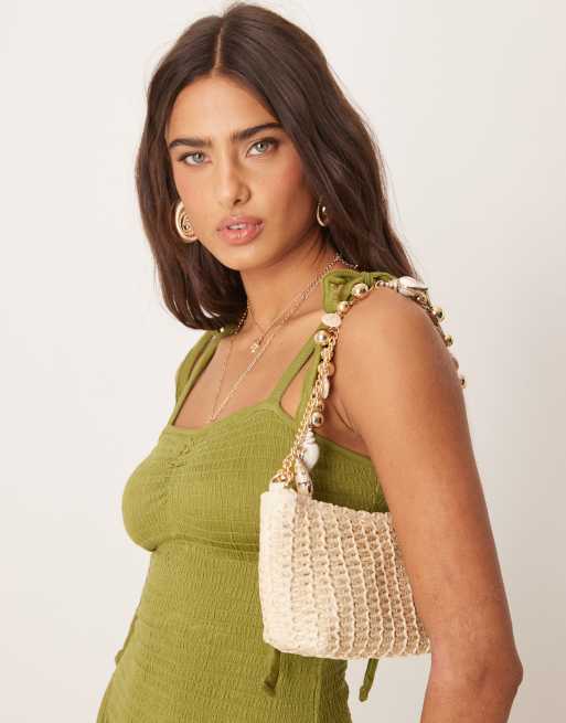 ASOS DESIGN straw shoulder bag with ball and chain handle with faux shell charms