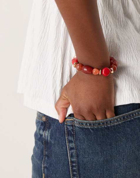 ASOS DESIGN stretch bracelet with beads in orange and red - view 1