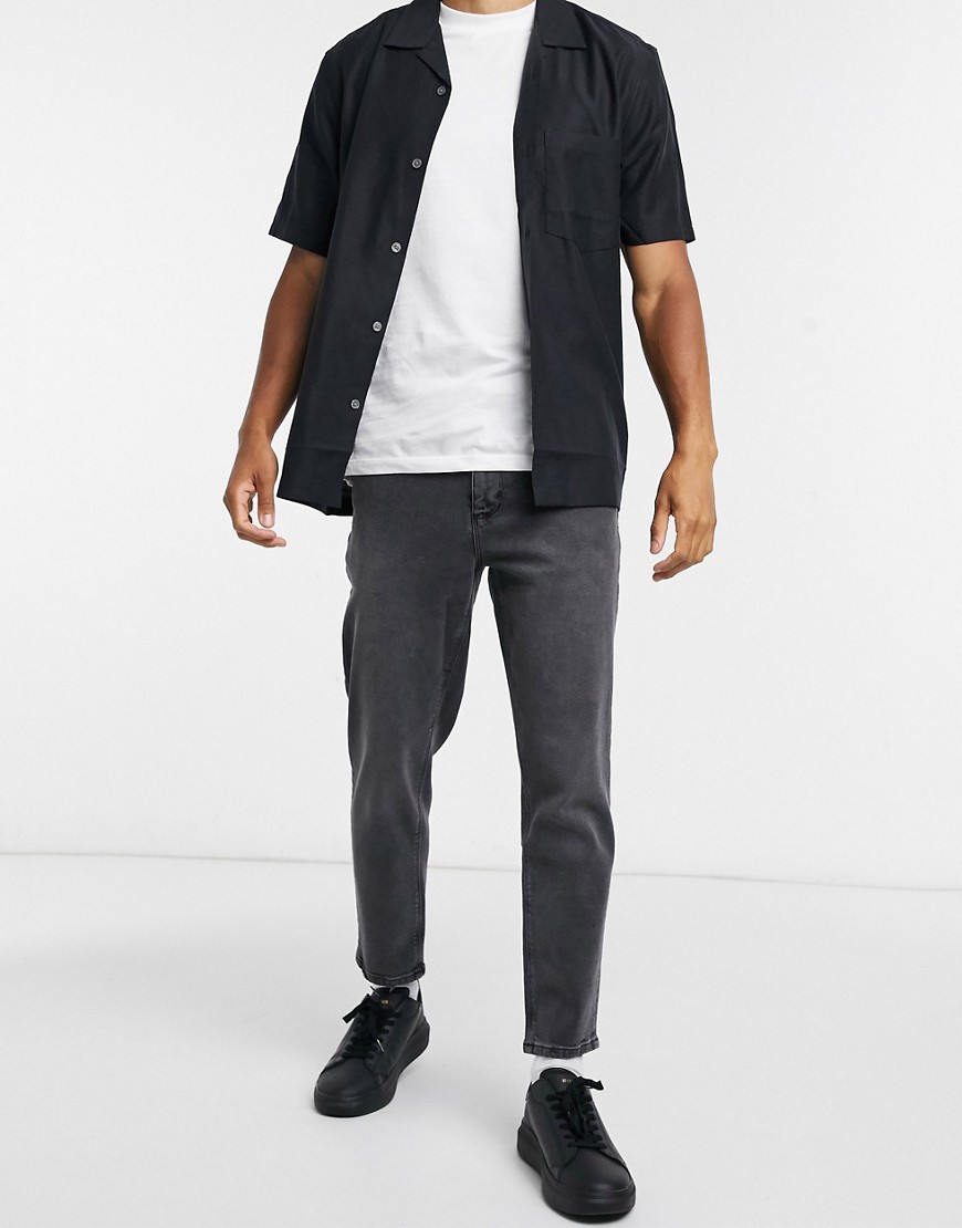 ASOS DESIGN stretch classic jean in washed black with destroyed hem