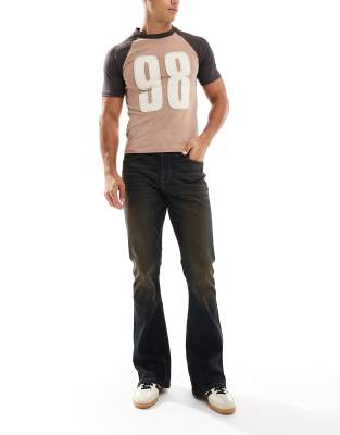 stretch flare jeans in black with brown tint