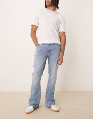 stretch flare jeans in light wash blue