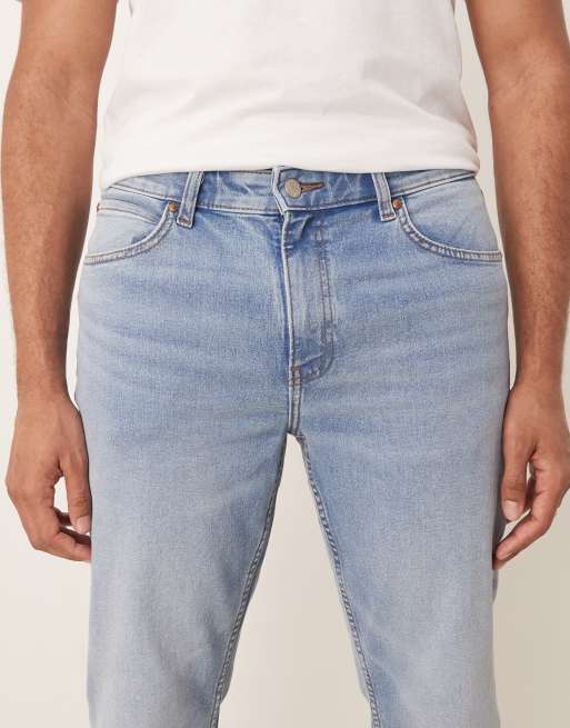 ASOS DESIGN stretch flare jeans in light wash blue