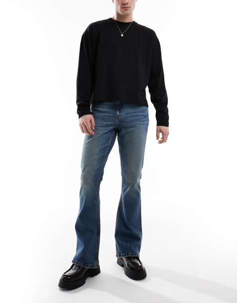 ASOS DESIGN stretch flare jeans in mid wash blue - view 1