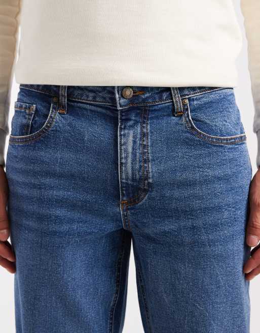 ASOS DESIGN – Stretch-Karottenjeans in dunkelblauer Waschung, 4 von 5