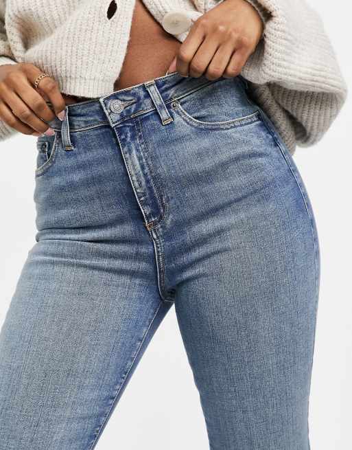 ASOS DESIGN – Stretch-Schlagjeans mit hoher Taille im Stil der 2000er, mittlere Vintage-Waschung, 3 von 4