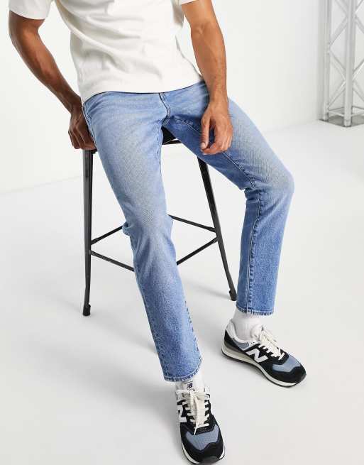 ASOS DESIGN stretch slim jeans in indigo