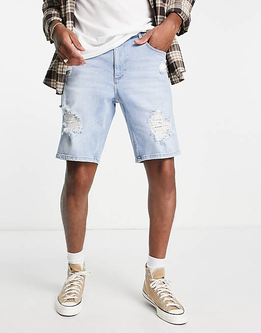  stretch slim denim shorts in light wash blue with rips and bum rip 