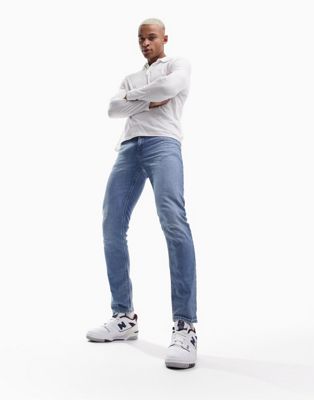 ASOS DESIGN stretch slim jeans in dark wash blue   - ASOS Price Checker