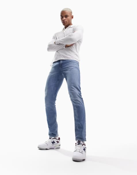 ASOS DESIGN stretch slim jeans in dark wash blue - view 1