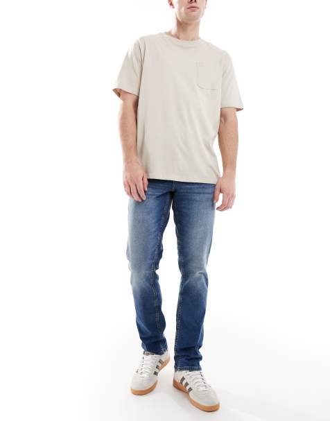 ASOS DESIGN stretch slim jeans in dark wash blue