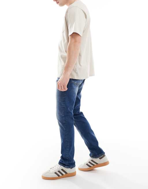 ASOS DESIGN stretch slim jeans in dark wash blue, 3 of 5
