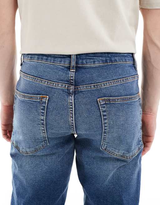 ASOS DESIGN stretch slim jeans in dark wash blue, 4 of 5