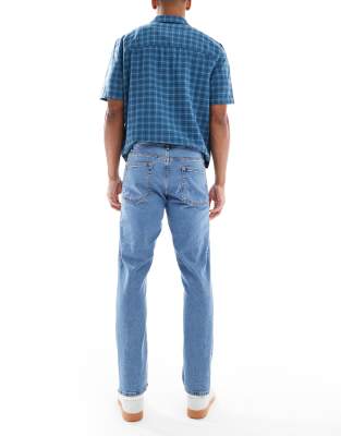 ASOS DESIGN stretch slim jeans in flat mid wash blue