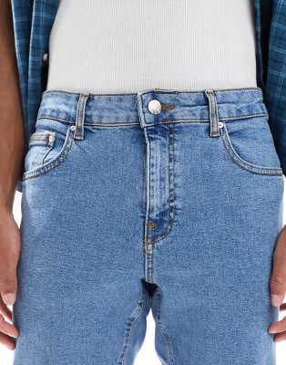 ASOS DESIGN stretch slim jeans in flat mid wash blue