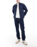 ASOS DESIGN stretch slim jeans in indigo